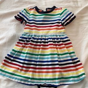 Rainbow dress with body suit snaps.